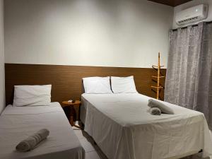 VILA LITORANEA Hotel客房内的一张或多张床位