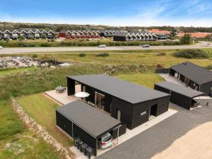an overhead view of a house with black roofs at Luxury Retreat in Lokken - By Traum Ferienwohnungen in Løkken