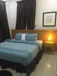 Katil atau katil-katil dalam bilik di Greens Manor VI
