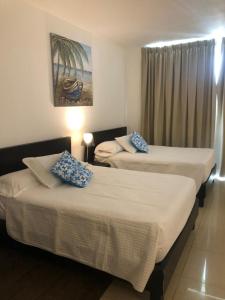 Postel nebo postele na pokoji v ubytování Playa Blanca SC + 29 fotografií