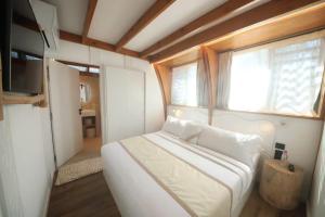 Tiki Beach Moorea , Piscine & Petit Déjeunerにあるベッド