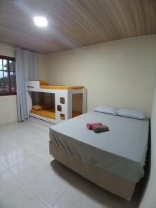 Katil atau katil-katil dalam bilik di Rosemary Hospedagem