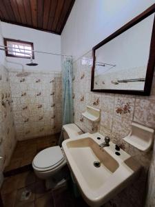 Koupelna v ubytování Caravel Hostal