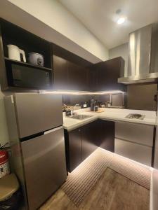 Η κουζίνα ή μικρή κουζίνα στο Prime Location Walk to Nightlife! The Gramercy