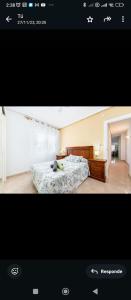 a picture of a bedroom with a bed at Torrebeach in Torre de la Horadada +9 photos