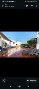 a view of a building with a patio with tables at Torrebeach in Torre de la Horadada