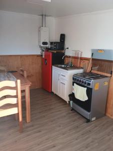 Kuchyň nebo kuchyňský kout v ubytování Departamento interior 4 Villarrica Céntrico