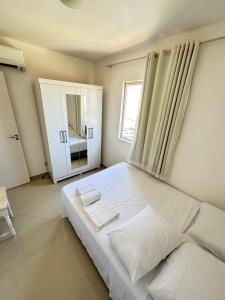 Postel nebo postele na pokoji v ubytování Apartamento Agradável Mobiliado - Praia do Sul