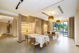 Fotografie z fotogalerie ubytování 沐雨云舒合院 v destinaci Xishuangbanna International Airport