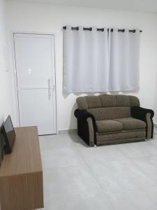 Χώρος καθιστικού στο Casa de condomínio