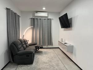 TV a/nebo společenská místnost v ubytování Mami Apartments