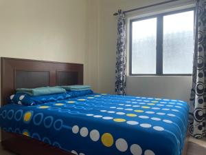 Postel nebo postele na pokoji v ubytování KB Guesthouse