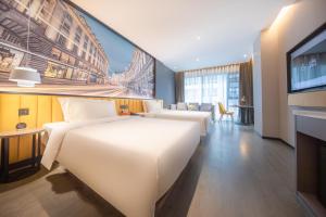 Atour X Hotel Wuhan Hang Lung Plaza NetEase Cloud Music 객실 침대