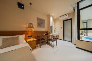 Postel nebo postele na pokoji v ubytování 厦门椿野酒店