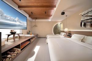 Katil atau katil-katil dalam bilik di Xueting Songjiangyue Hidden Courtyard Hotel