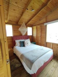 Glamping El Muelle客房内的一张或多张床位