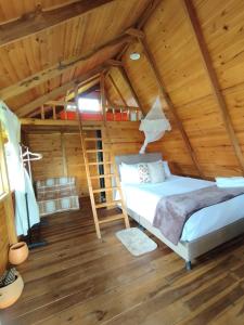 Glamping El Muelle客房内的一张或多张床位