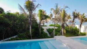 Bazén v ubytování Akumal Escape Beach Access 7 Pools With Ocean View Beach Club nebo v jeho okolí