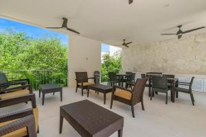 Posezení v ubytování Akumal Escape Beach Access 7 Pools With Ocean View Beach Club