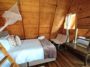 Glamping El Muelle客房内的一张或多张床位