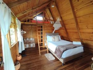 Glamping El Muelle客房内的一张或多张床位