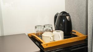 Comodidades para chá e café em La Plage Residence