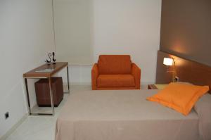 Posteľ alebo postele v izbe v ubytovaní Hotel Diego
