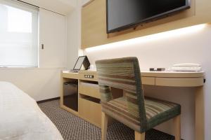 TV a/nebo společenská místnost v ubytování Keio Presso Inn Nihonbashi Kayabacho