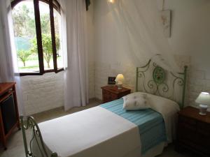 Postel nebo postele na pokoji v ubytování Villa Margherita Suite & charme