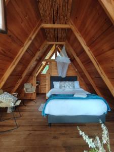 Glamping El Muelle客房内的一张或多张床位