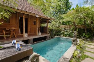 Bazén v ubytování Umah Hartley Ubud Villa nebo v jeho okolí