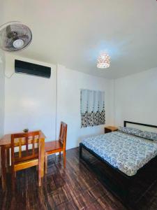 Postel nebo postele na pokoji v ubytování Ananas Guesthouse