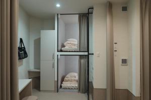 Koupelna v ubytování HOTEL minimumms女性専用カプセルホテルWomen only hotel