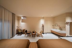 Postel nebo postele na pokoji v ubytování 厦门椿野酒店