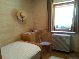 Ένα ή περισσότερα κρεβάτια σε δωμάτιο στο Ferienhäuschen Sans Pareille bei Bayreuth