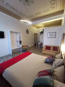 Postel nebo postele na pokoji v ubytování Tiritù Apartments