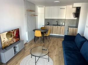 Kuchyň nebo kuchyňský kout v ubytování Apartament Park Centrum