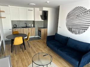 Kuchyň nebo kuchyňský kout v ubytování Apartament Park Centrum