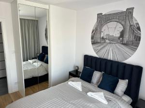 Postel nebo postele na pokoji v ubytování Apartament Park Centrum