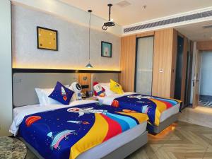 Lijiang MΛISON Hotel客房内的一张或多张床位