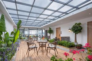 Lijiang MΛISON Hotel的休息区