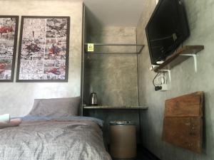 TV a/nebo společenská místnost v ubytování SolarCell Private Homestay - โซล่าเซลล์ไพรเวทโฮมสเตย์