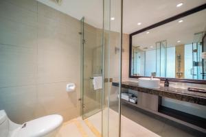 Koupelna v ubytování Mei Gang Hotel