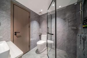 Koupelna v ubytování Mei Gang Hotel