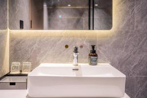 Koupelna v ubytování Mei Gang Hotel