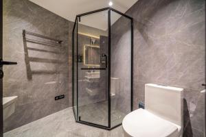Koupelna v ubytování Mei Gang Hotel