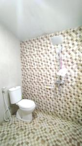 Ένα μπάνιο στο Sadana Villahouse Ngadinegaran