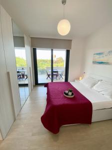 Alba Rossaにあるベッド