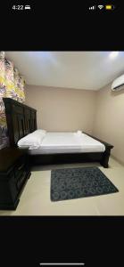 Postel nebo postele na pokoji v ubytování Alladin suites hospitality service