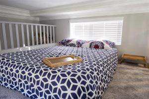 a bedroom with a bed with a wooden box on it at Blue Pacific in Fort Bragg